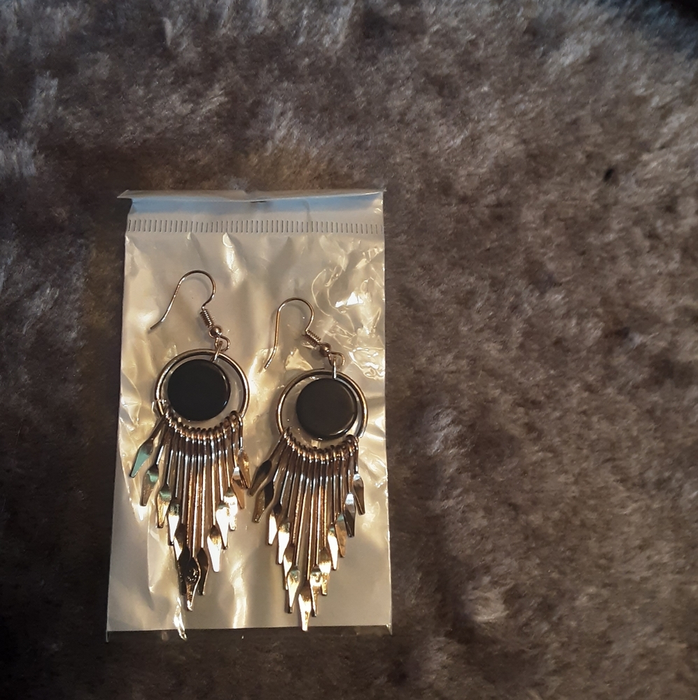 Gold tone dangle earrings